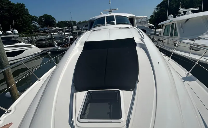 Slide: The Image of 2002 Sea Ray 480 Motor Yacht docked at marina, sunny day. - 7