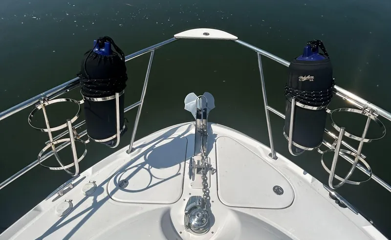 Slide: The Image of Bow of 2002 Sea Ray 480 Motor Yacht with anchor and fender holders. - 8