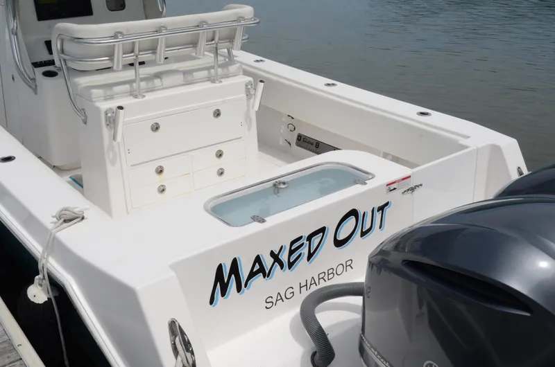 Slide: The Image of 2017 Contender 28 Sport boat with "Maxed Out" name, docked at Sag Harbor. - 20