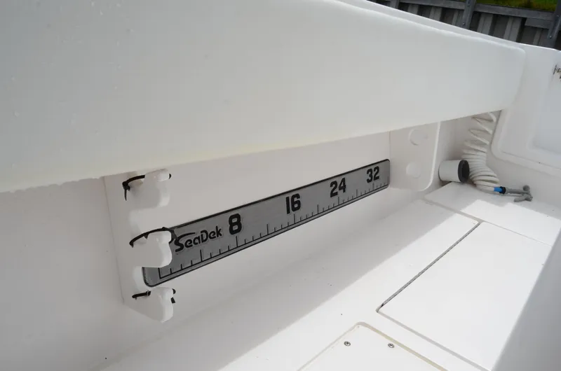 Slide: The Image of 2017 Contender 28 Sport boat interior with SeaDek measuring ruler. - 21