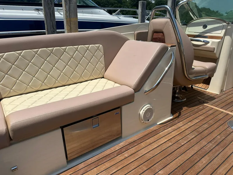Slide: The Image of Luxurious interior of 2019 Chris-Craft Launch 30 boat with elegant seating and wooden deck. - 13
