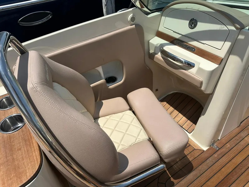 Slide: The Image of Luxurious interior of 2019 Chris-Craft Launch 30 boat with elegant seating and wood accents. - 16