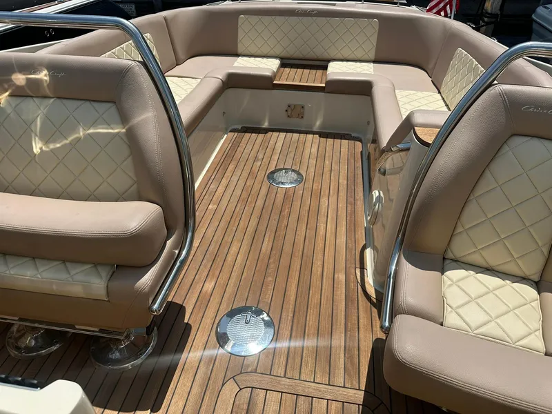 Slide: The Image of 2019 Chris-Craft Launch 30 interior with luxurious seating and teak flooring. - 23