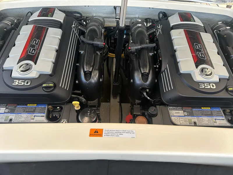 Slide: The Image of Twin Mercury 6.2L 350 engines in a 2019 Chris-Craft Launch 30 boat. - 28