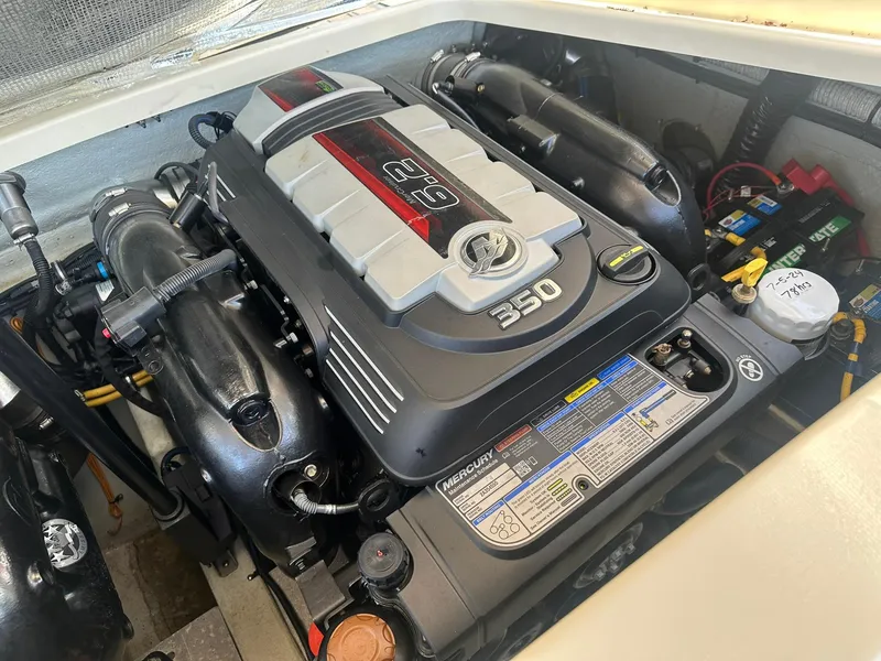 Slide: The Image of 2019 Chris-Craft Launch 30 engine compartment featuring a Mercury 350 engine. - 30