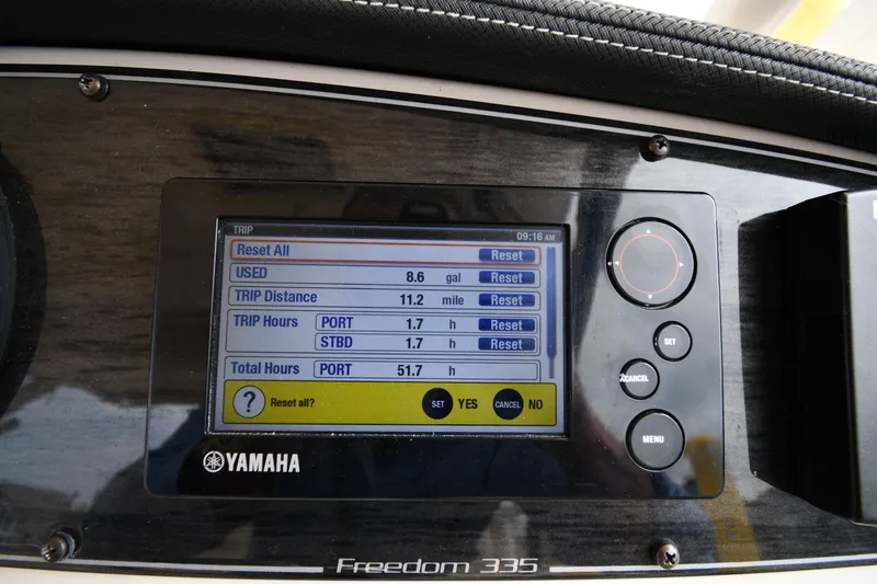 Slide: The Image of Yamaha display on 2018 Grady-White Freedom 335 showing trip data and settings. - 15