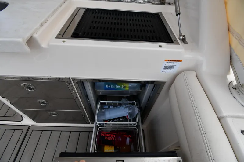 Slide: The Image of 2018 Grady-White Freedom 335 boat galley with grill and storage drawers. - 28