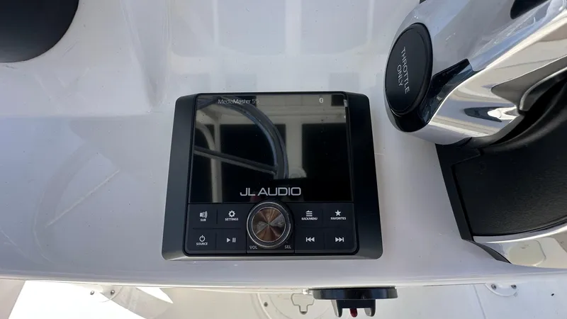 Slide: The Image of JL Audio MediaMaster 55 on 2025 Boston Whaler 190 Montauk boat dashboard. - 15
