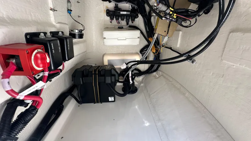 Slide: The Image of Interior view of 2025 Boston Whaler 190 Montauk boat's electrical and mechanical components. - 19