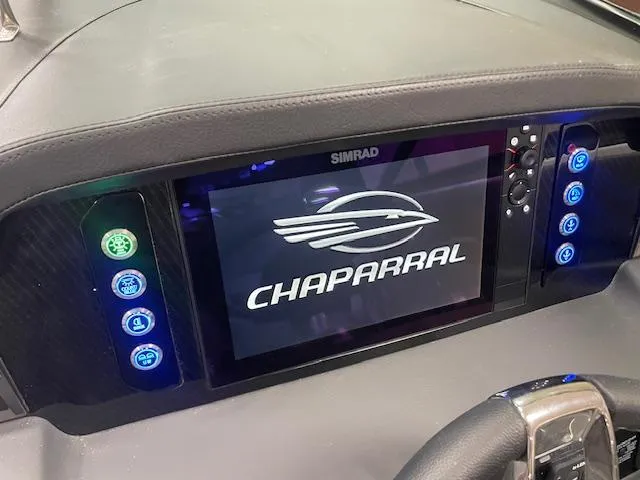 Slide: The Image of Dashboard of 2025 Chaparral 26 Surf boat with Simrad display screen. - 8