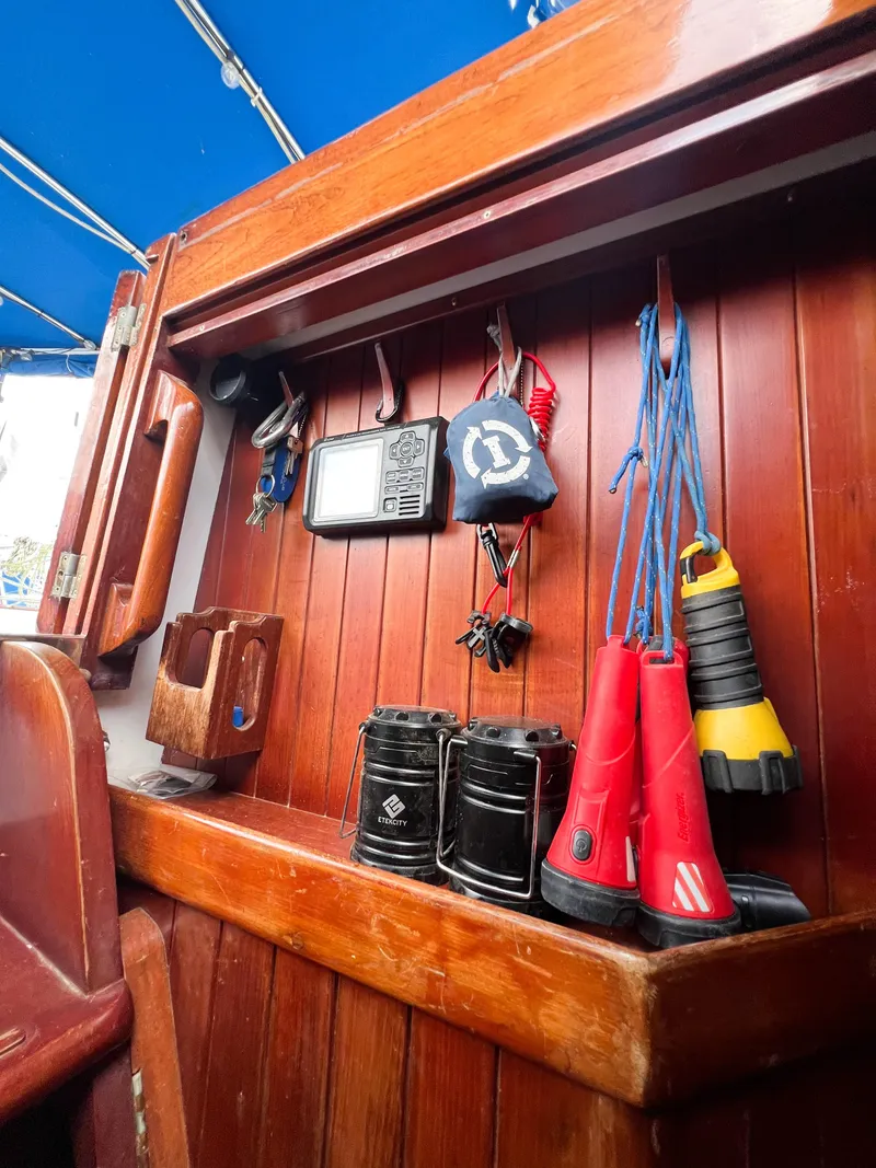 Slide: The Image of Wooden interior of 1986 Tayana Vancouver 42 sailboat with nautical equipment and accessories. - 45