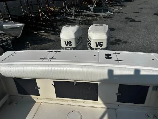 Slide: The Image of 1993 Grady-White Sailfish 252 boat with dual V6 Johnson outboard engines. - 17