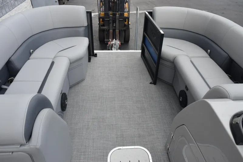 Slide: The Image of 2026 Bentley Pontoons Legacy 223 Swingback interior with gray seating and spacious layout. - 10