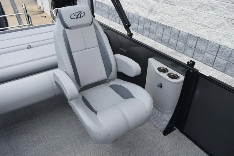 Slide: The Image of 2026 Bentley Pontoons Legacy 223 Swingback seat with cup holders, featuring sleek design and comfort. - 13
