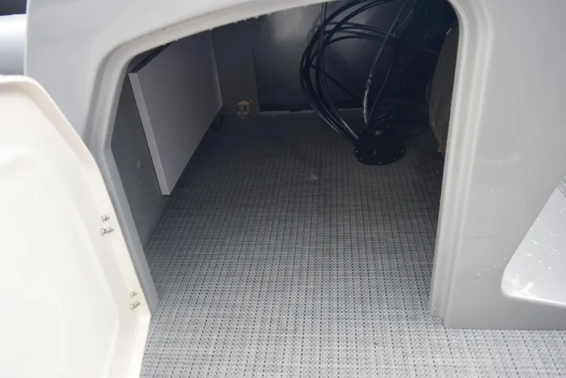 Slide: The Image of Interior storage compartment of 2026 Bentley Pontoons Legacy 223 Swingback boat. - 18