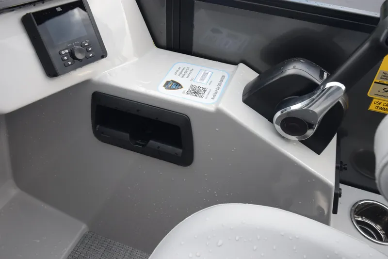 Slide: The Image of 2026 Bentley Pontoons Legacy 223 Swingback dashboard with control panel and throttle lever. - 9