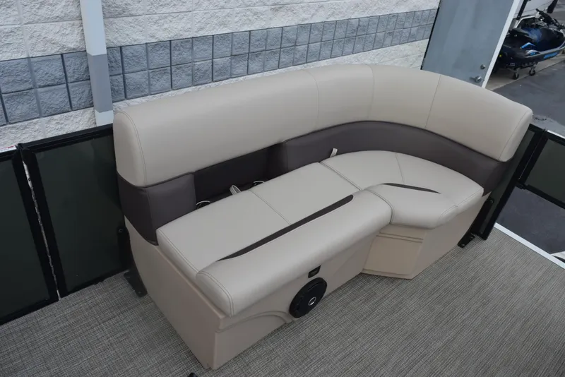 Slide: The Image of 2026 Bentley Pontoons Fish 243 Fish n' Cruise interior seating, beige and brown upholstery. - 11