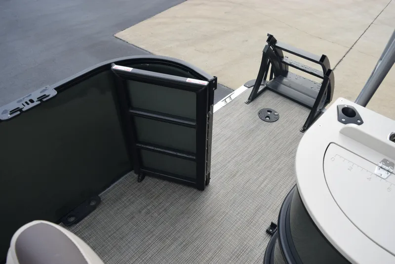 Slide: The Image of 2026 Bentley Pontoons Fish 243 Fish n' Cruise deck with ladder and gate. - 21