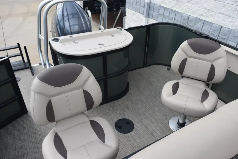 Slide: The Image of 2026 Bentley Pontoons Fish 243 Fish n' Cruise interior with swivel seats and fishing station. - 7