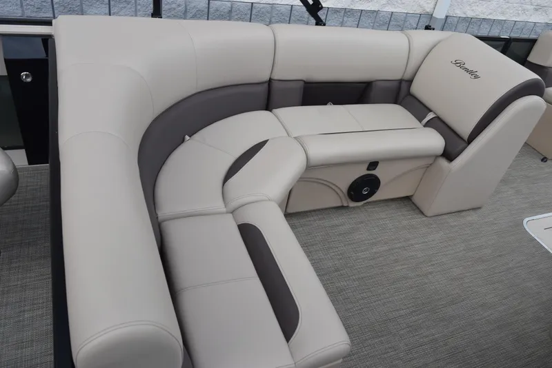 Slide: The Image of 2026 Bentley Pontoons Fish 243 Fish n' Cruise interior with luxurious seating and elegant design. - 8