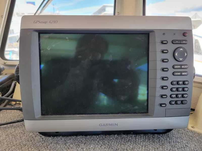 Slide: The Image of Garmin GPSmap 4210 on 2000 SeaSport 2400 XL Limited boat dashboard. - 27