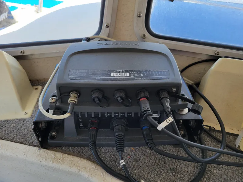 Slide: The Image of Garmin marine device with cables on a SeaSport 2400 XL Limited, year 2000. - 28