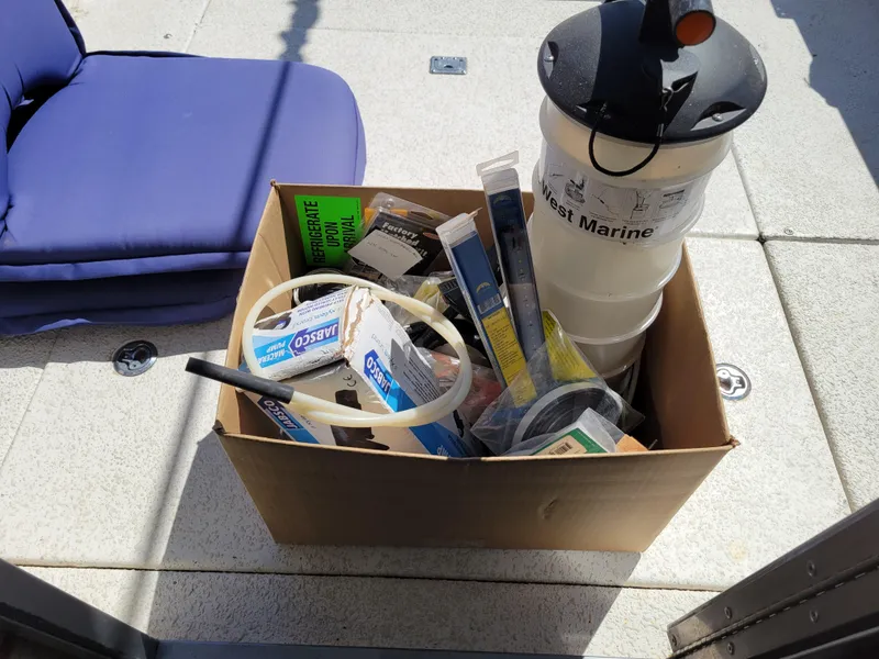 Slide: The Image of Box of marine supplies on SeaSport 2400 XL Limited boat deck, 2000 model. - 36