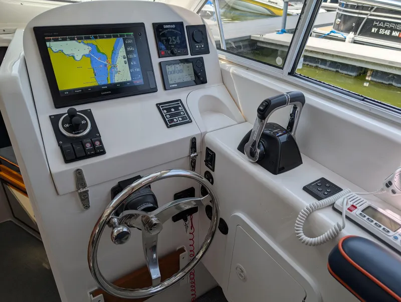 Slide: The Image of Helm of 2018 True North 34OE boat with navigation and control systems. - 11