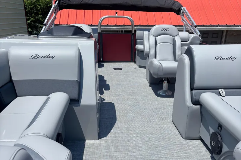 Slide: The Image of 2025 Bentley Pontoons 223 NAVIGATOR interior with luxurious gray seating and modern design. - 7