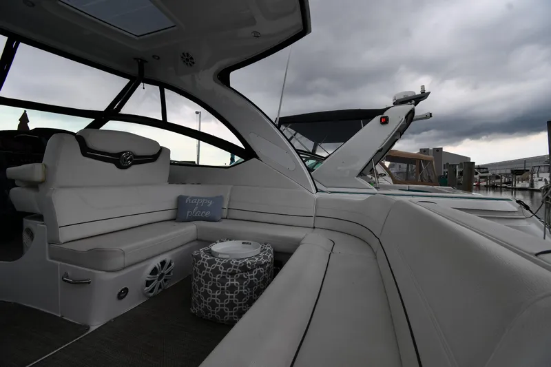 Slide: The Image of Luxurious 2019 Cruisers Yachts 380 Express interior with plush seating and stylish decor. - 18