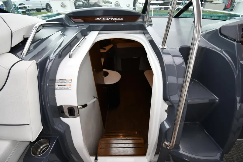 Slide: The Image of 2019 Cruisers Yachts 380 Express cabin entrance with sleek interior design. - 30