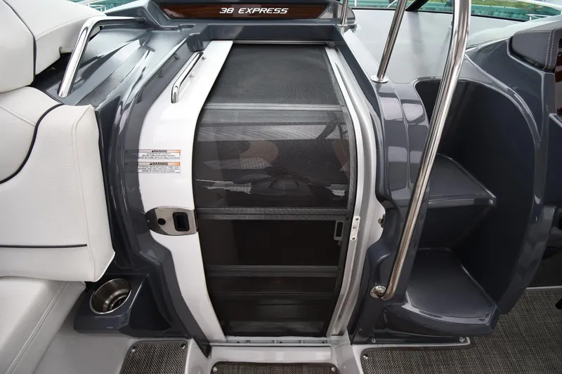 Slide: The Image of 2019 Cruisers Yachts 380 Express cabin entrance with sleek design and modern features. - 31