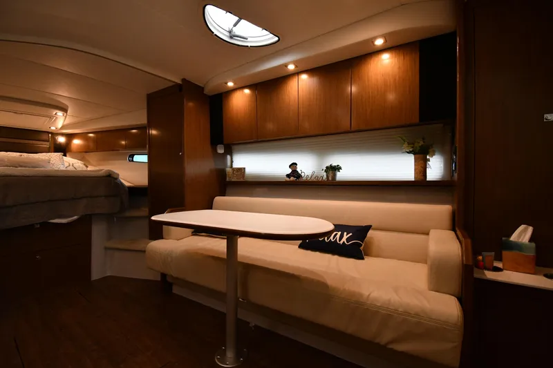 Slide: The Image of Luxurious interior of 2019 Cruisers Yachts 380 Express with cozy seating and elegant wood finishes. - 37