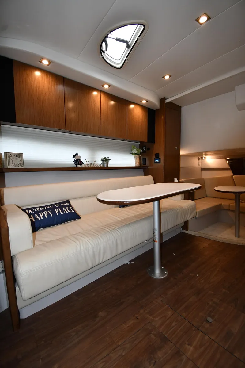 Slide: The Image of Interior of 2019 Cruisers Yachts 380 Express, featuring elegant seating and modern design. - 44