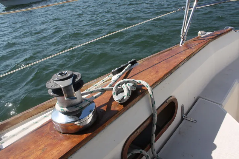 Slide: The Image of Deck of 1986 Sabre 34 MK II sailboat with winch and ropes. - 14