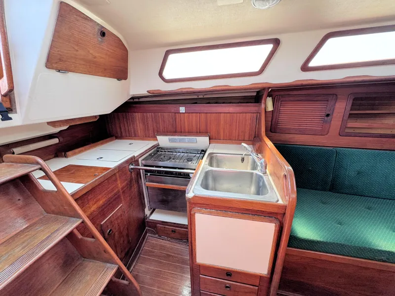 Slide: The Image of Interior of 1986 Sabre 34 MK II sailboat with kitchen and seating area. - 31