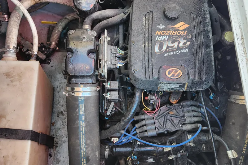 Slide: The Image of Engine compartment of a 1975 Bertram 28 Flybridge Cruiser with MerCruiser 350 MPI Horizon. - 21