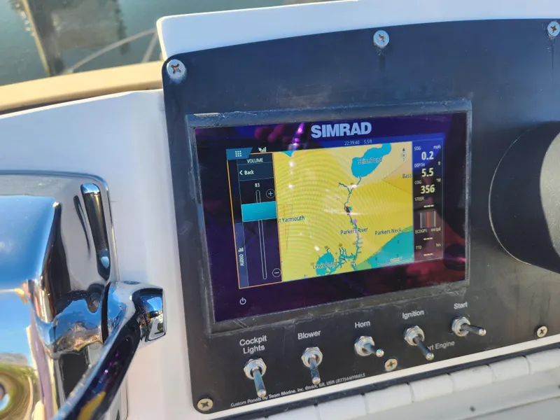 Slide: The Image of Simrad navigation system on 1975 Bertram 28 Flybridge Cruiser dashboard. - 5