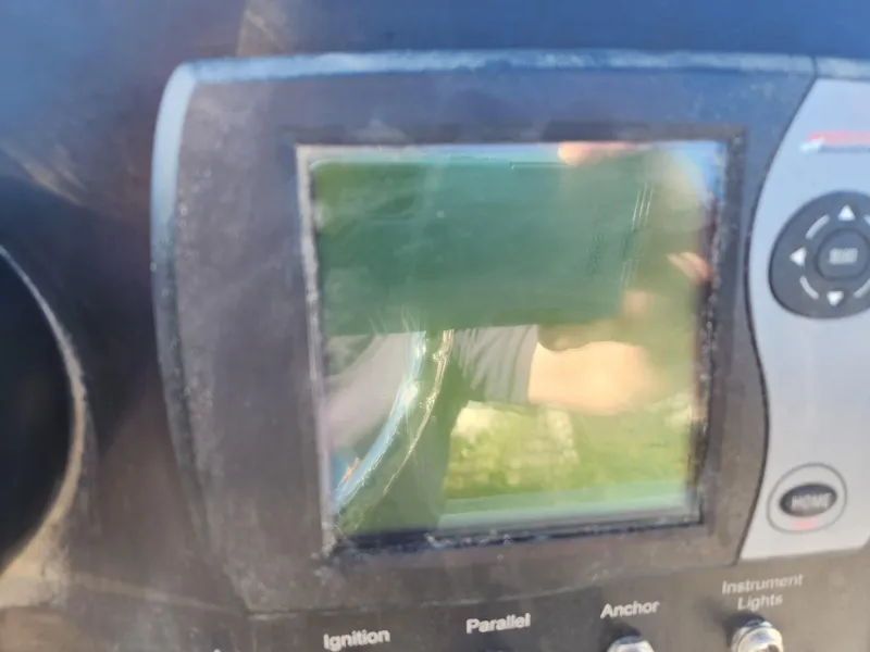 Slide: The Image of Control panel of a 1975 Bertram 28 Flybridge Cruiser boat. - 6