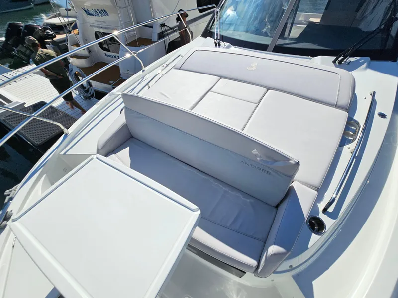 Slide: The Image of 2024 Beneteau Antares 12 yacht with luxurious seating and sleek design. - 22