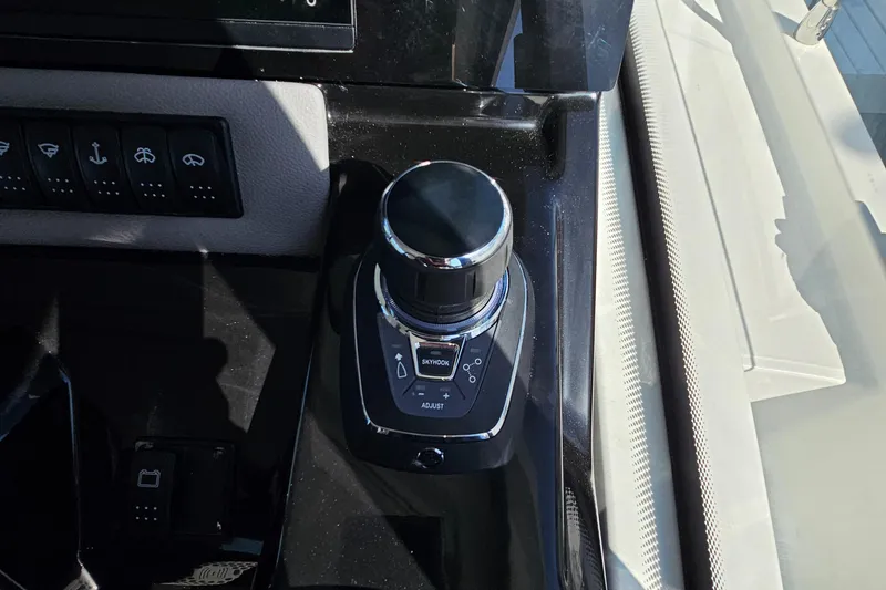 Slide: The Image of Control panel of 2024 Beneteau Antares 12 boat with joystick and buttons. - 36