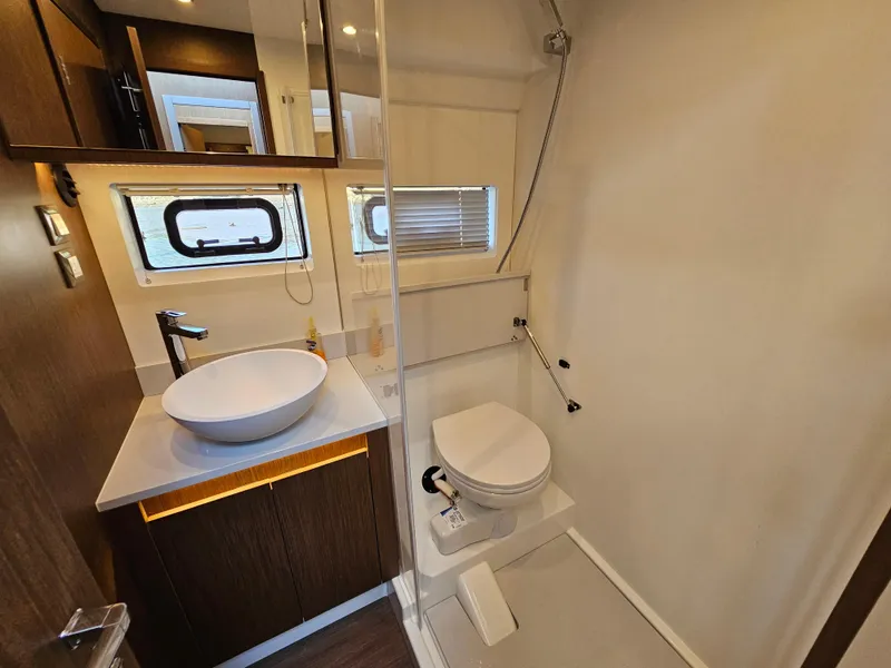 Slide: The Image of 2024 Beneteau Antares 12 bathroom with modern fixtures and sleek design. - 46
