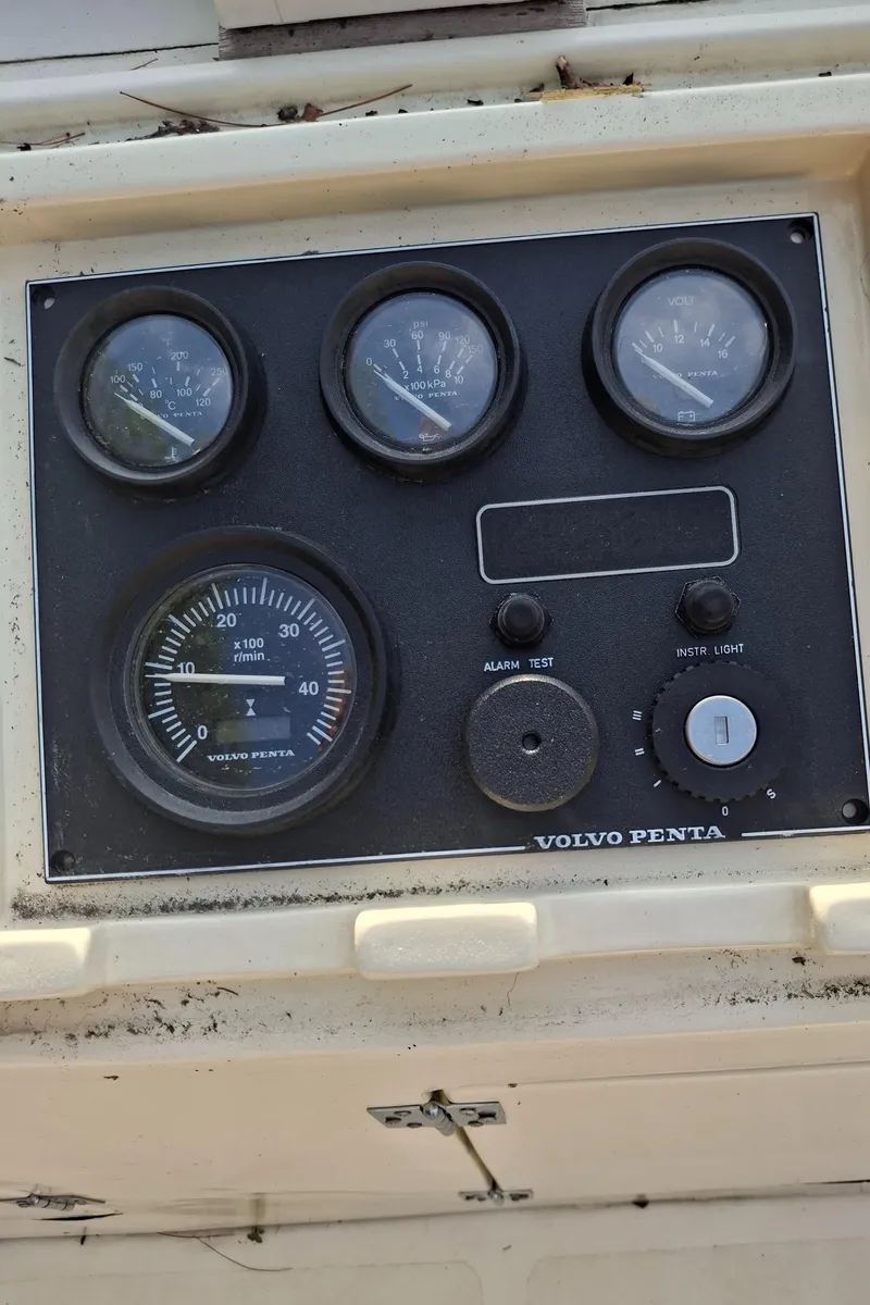 Slide: The Image of Control panel of a 2003 Duffy 35 Downeast Flybridge Cruiser with Volvo Penta gauges. - 20