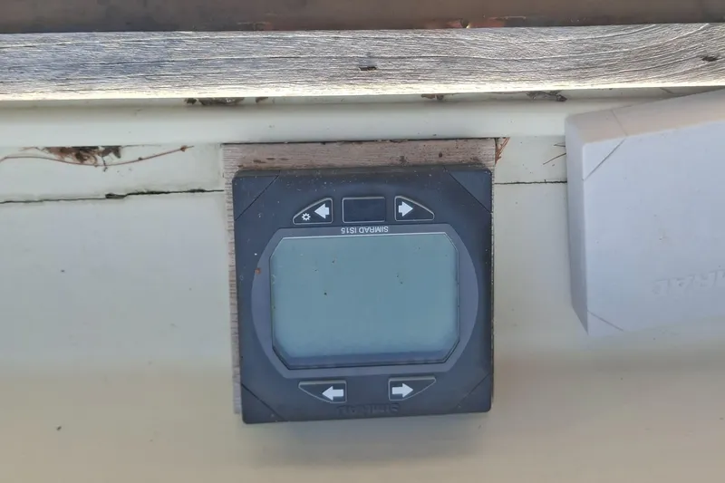 Slide: The Image of Control panel on a 2003 Duffy 35 Downeast Flybridge Cruiser boat dashboard. - 21