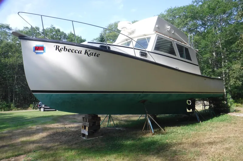 Slide: The Image of 2003 Duffy 35 Downeast Flybridge Cruiser on land, "Rebecca Kate," for sale by owner. - 29