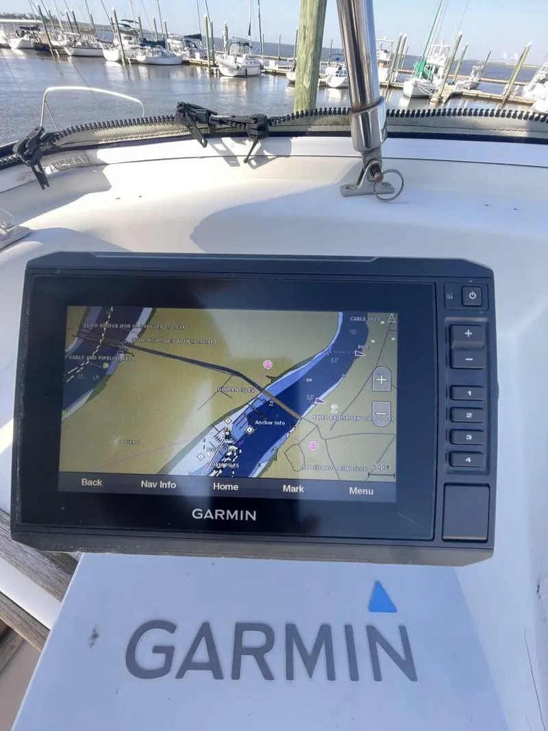 Slide: The Image of Garmin navigation system on 1984 Mainship MK III boat, docked at marina. - 24