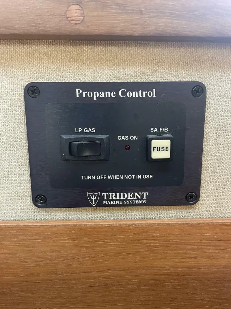 Slide: The Image of 1984 Mainship MK III propane control panel by Trident Marine Systems. - 28