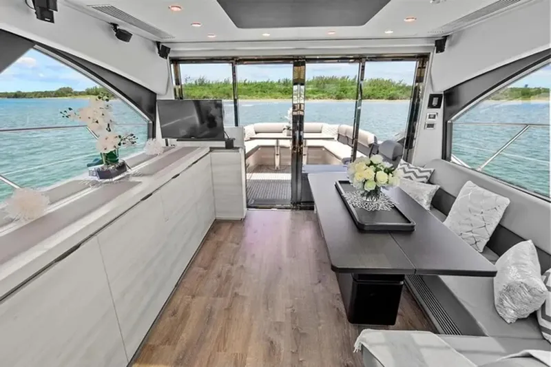 Slide: The Image of Luxurious interior of 2015 Azimut 55S yacht with elegant decor and scenic water view. - 11