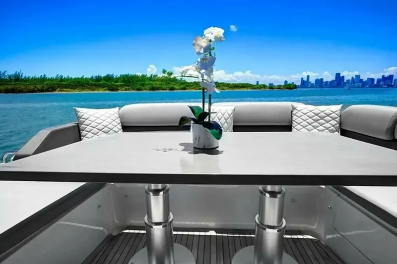 Slide: The Image of Luxurious 2015 Azimut 55S yacht interior with elegant seating and scenic ocean view. - 7