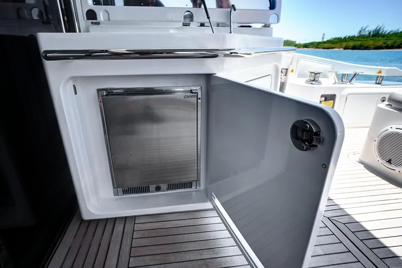 Slide: The Image of 2015 Azimut 55S yacht with open storage compartment on deck. - 8